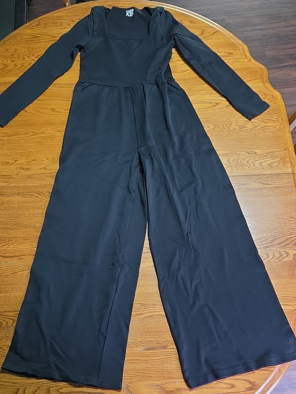 Black Long-Sleeve Wide-Leg Jumpsuit by OQQ
